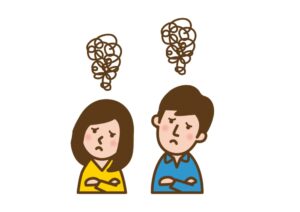 困った顔の夫婦